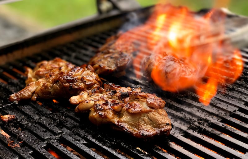 Honey soy chicken chops on the grill for a private BBQ menu